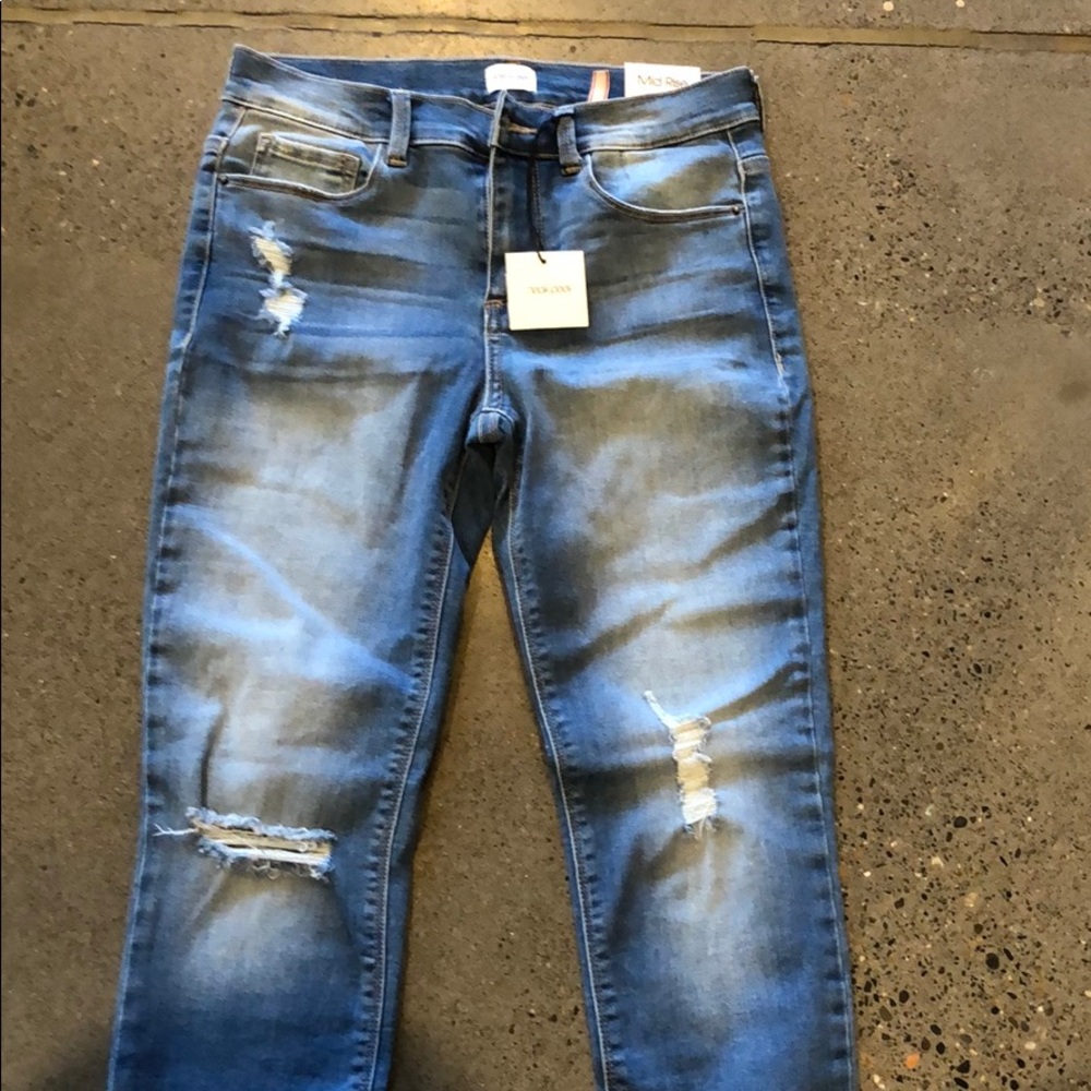 Mid rise sneak peak jeans